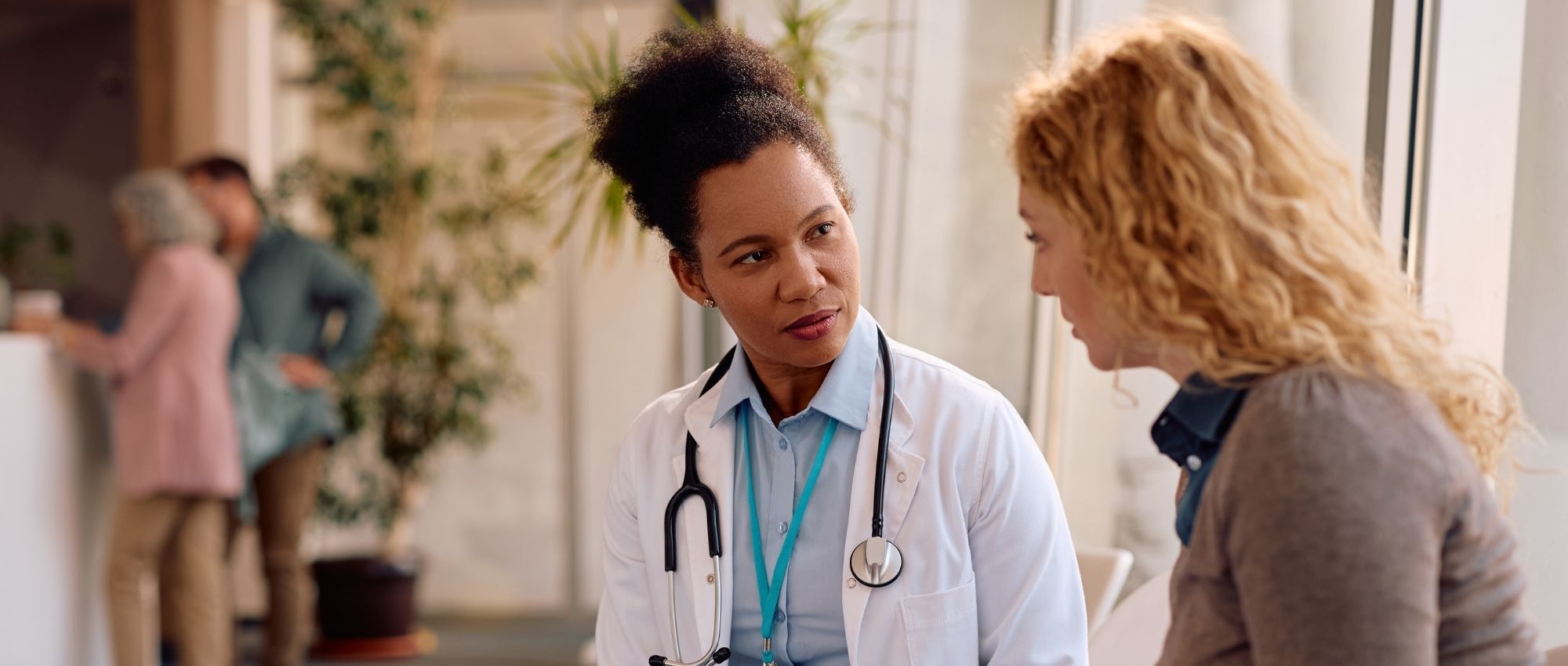 A doctor explaining the detox placement services provided at Luna Recovery for Women in North Andover, MA.