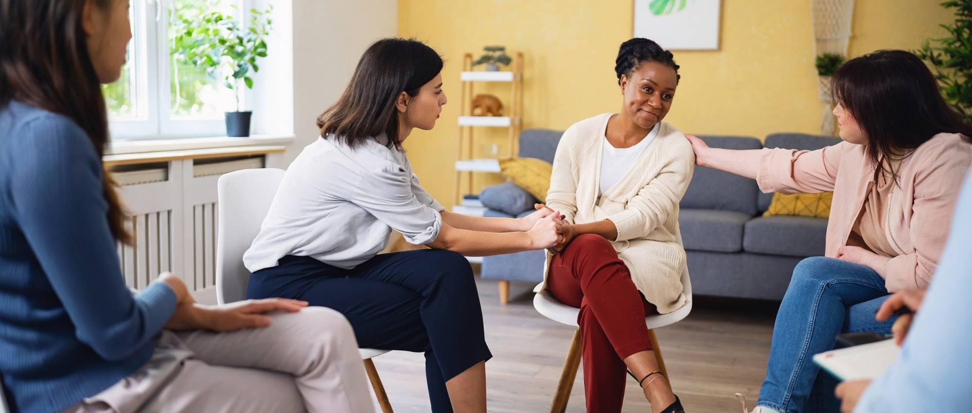 A group of women in an outpatient program for mental health treatment for women at Luna Recovery for Women in North Andover, MA.