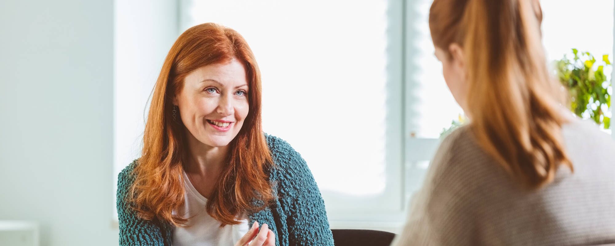 An older woman with red hair in an outpatient program for mood disorder treatment at Luna Recovery for Women in North Andover, MA.